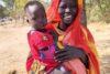 Agei s jediným dítětem, které se jí podařilo odvézt do Jižního Súdánu. Zbylé tři zůstaly s rodinou jejího bývalého majitele